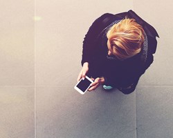 Overhead view of woman on her phone